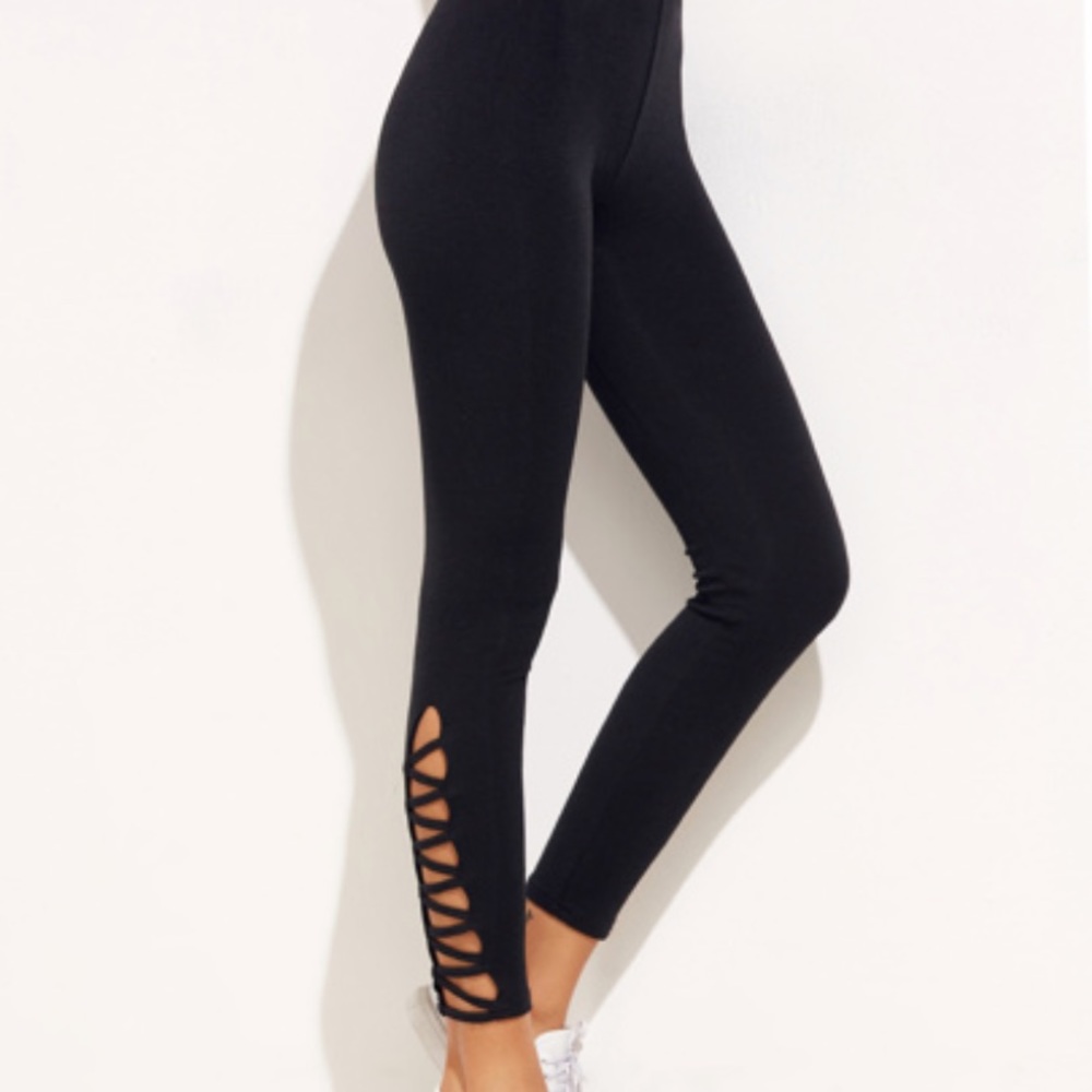 black crisscrossed leggings